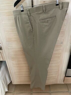 Dockers Khaki Men’s Chino Pants 46 x 32 size pleated front.  Good condition.